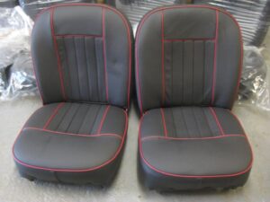 MGC PAIR OF NON RECLINING LEATHER SEATS BLACK WITH RED PIPING 1967-68 MGC S777AMMGC