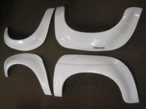 SEBWA  MGB FIBREGLASS 4 PIECE FLARED WHEEL ARCH ONLY SET SEBRING