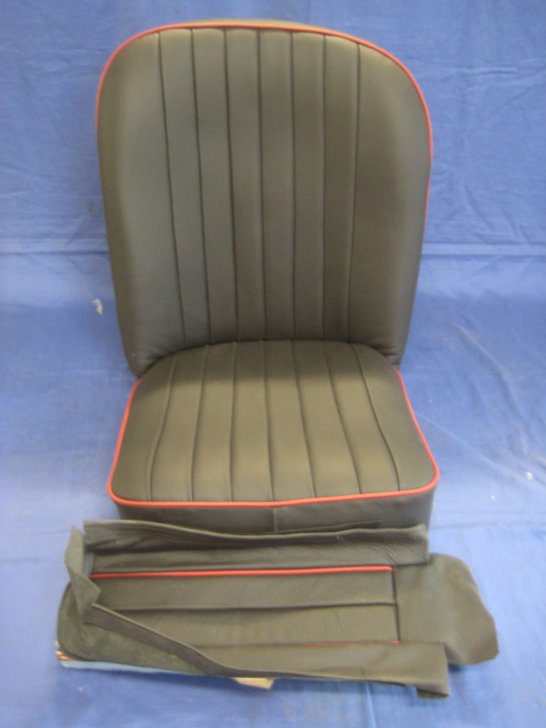 MGA PAIR LEATHER SEATS BLACK WITH RED PIPING NON RECLINER MGA INC ARMREST S752AM